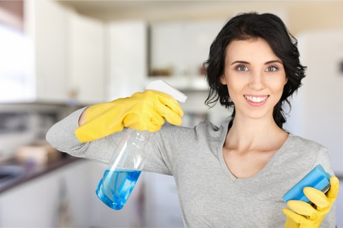 Technician preparing cleaning treatment for carpet fibres